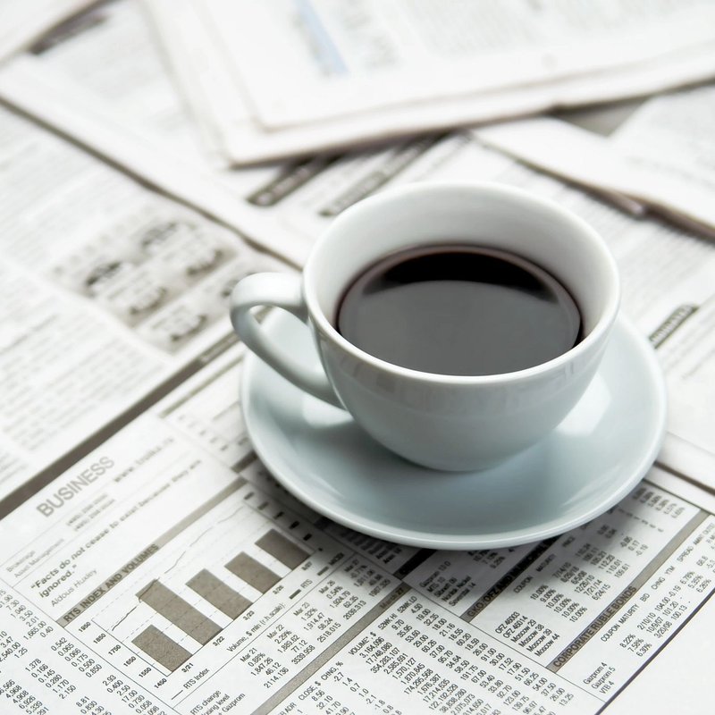coffee mug on newspaper - Cut-Rite Carpets & Design Center in Scarsdale,  NY